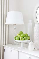 White accessories on sideboard
