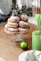 Doughnuts on glass cake stand