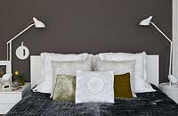 White cushions on bed
