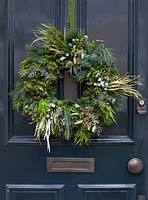 Classic front door with christmas wreath
