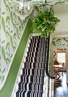 Striped runner on stairs