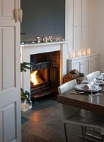 Wood burning stove in dining room