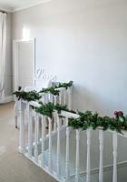 Garland wrapped around bannisters