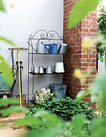 Gardening equipment on metal shelves
