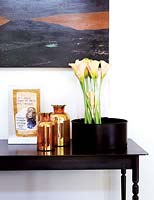 Contemporary accessories on console table