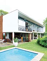 Mid century house and garden with pool