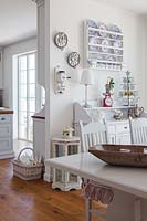 White furniture and accessories in dining room