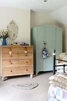 Stripped pine chest of drawers