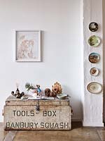 Eclectic accessories on wooden trunk