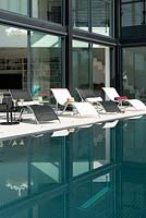 Loungers by pool