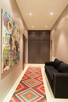 Patterned rug in corridor