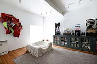 Modern bedroom with art display