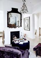 Ornate mirror over fireplace