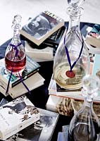 Books and decanters on coffee table