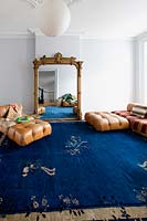 Blue rug on living room floor