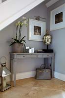 Console table under stairs