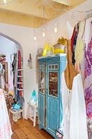 Shop interior filled with clothing and homeware