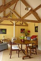Country dining room with exposed beams