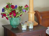 Colourful flowers on bedside cabinet