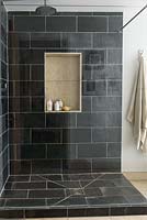 Shower cubicle with built in storage