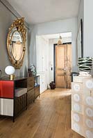 Eclectic furniture in hallway