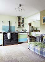 Colourful kitchen with range cooker