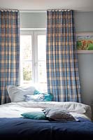 Colourful bedding and curtains