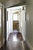 Hallway with polished wooden flooring