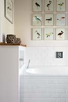 Bath with tiled splashback