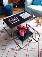 Metal coffee tables on patterned rug