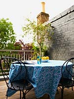 Patterned tablecloth on garden table