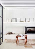 Minimal fireplace and art display