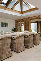 Wicker chairs at dining table