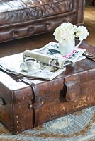 Leather trunk used as coffee table