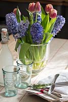 Colourful flowers on kitchen table