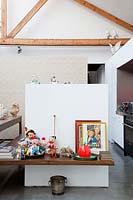 Toys and collectibles on wooden shelf