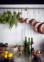 Cooking equipment hanging from rail