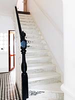 Staircase with mirror tiles
