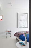 Modern painting on bedroom wall