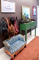Green console table in hall
