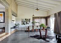 Open plan living space with concrete floors