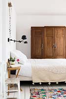 Wooden furniture by bed