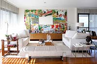 Modern living room with colourful art