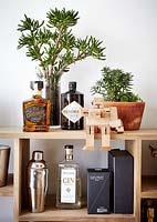 Drinks accessories on wooden shelving unit