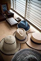 Hats on windowsill