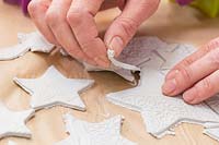 Making clay stars - Gently remove the unwanted clay from around the stars 