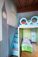 Childs bedroom with mural
