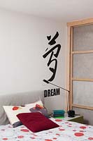 Bedroom wall decorated with wall stickers