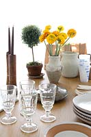 Yellow flowers on dining table 