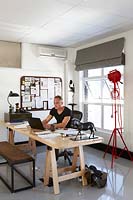 Laurie Wiid van Heerden working in his office